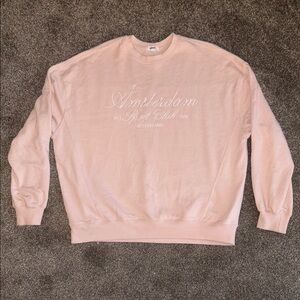 Garage Cozy Pink Crewneck Sweater with Embroidered Text
